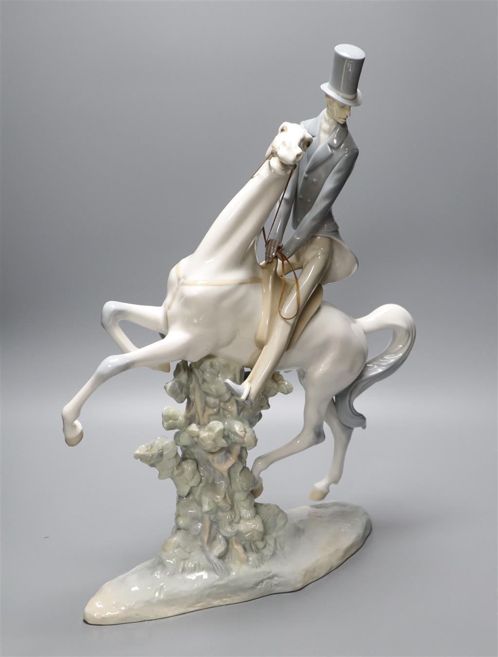 A Lladro figure of a gentleman on horse, height 50cm